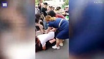 Man lays down on his mistress to protect her from his furious wife