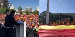 Más de 20.0000 personas en la Plaza de Colón convocadas por VOX en defensa de la unidad de España despliegan una bandera gigante