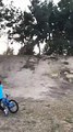 Skateboarder Goes Down A Dirt Hill And Fails