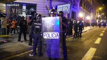Police pin detained Catalan protesters to ground