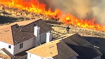 US wildfires raze California as 200,000 residents flee