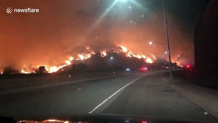 Evacuees film frighteningly close blaze along 405 Freeway near Getty Center