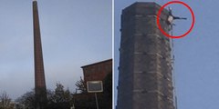 Este hombre se queda colgado de la chimenea de una fábrica, a más de 82 metros de altura
