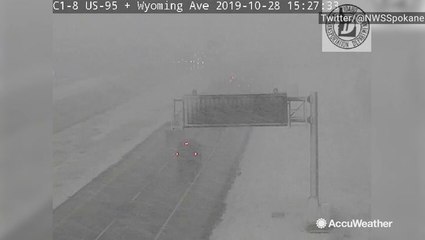 Burst of snow covers highway