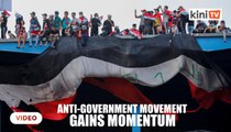 Iraqi protesters pack Baghdad square, anti-government movement gains momentum