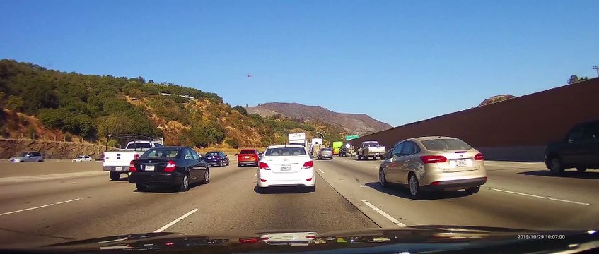 Helicopter Helps Extinguish Getty Fire Flames