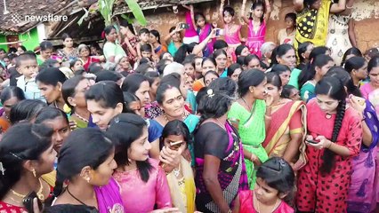 Smelly ritual sees villagers have massive cow dung fight in south India
