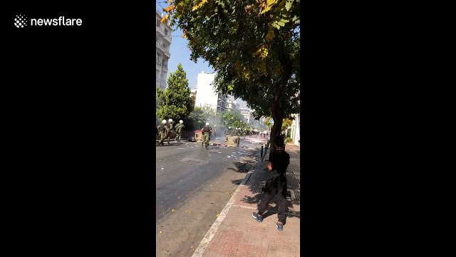 Riot police in Greece fire stun grenades amid running street battles with anarchists