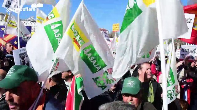 Spanish farmers gather outside Ministry of Agriculture in protest against working conditions