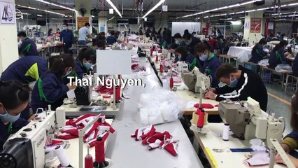 Coronavirus: une usine de masques au Vietnam tourne à plein régime pour répondre à la demande