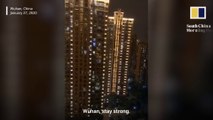 Wuhan Residents Chant 'Keep it up,Wuhan' out of their Windows to boost up the morale