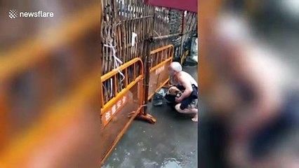 Elderly Chinese man swims across river to bypass blockade to get groceries from another village