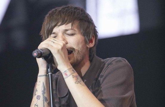 Niall Horan félicite Louis Tomlinson pour son nouvel album