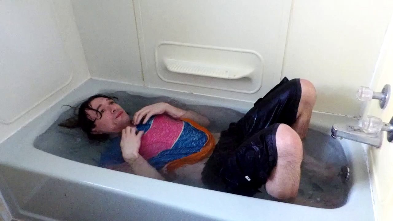 Ripping a Shirt Off While Underwater in a Bathtub
