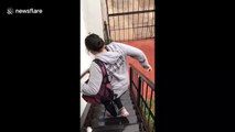 The effects of leg day! Mexican woman with sore legs slides down stairs