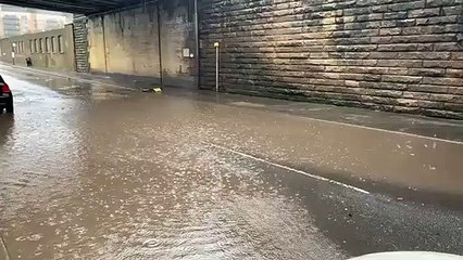 Driver battling through Leeds floods
