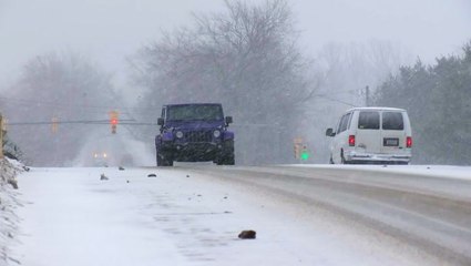 Road conditions worsen as snow comes down