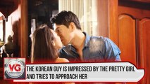 The Korean guy is impressed by the pretty girl and tries to approach her