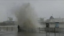 adult and child are almost swept away | People get hits by huge waves in Dover as Strom Ciara hits
