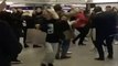 Tube travellers dance and sing along in Leicester Square station in central London