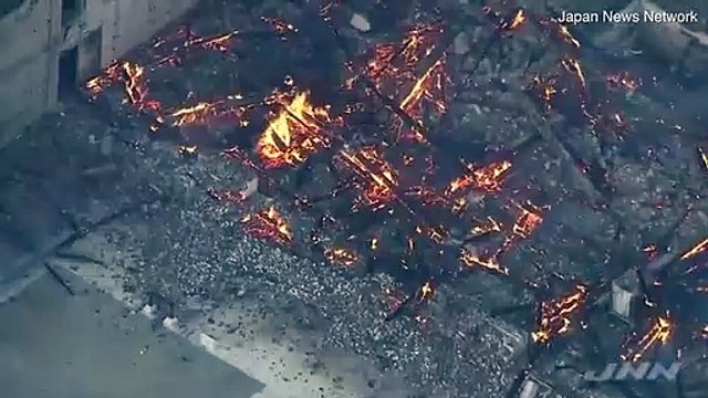Daytime footage of Shuri Castle shows it has burned almost entirely