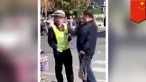 Old man slaps cop in the face