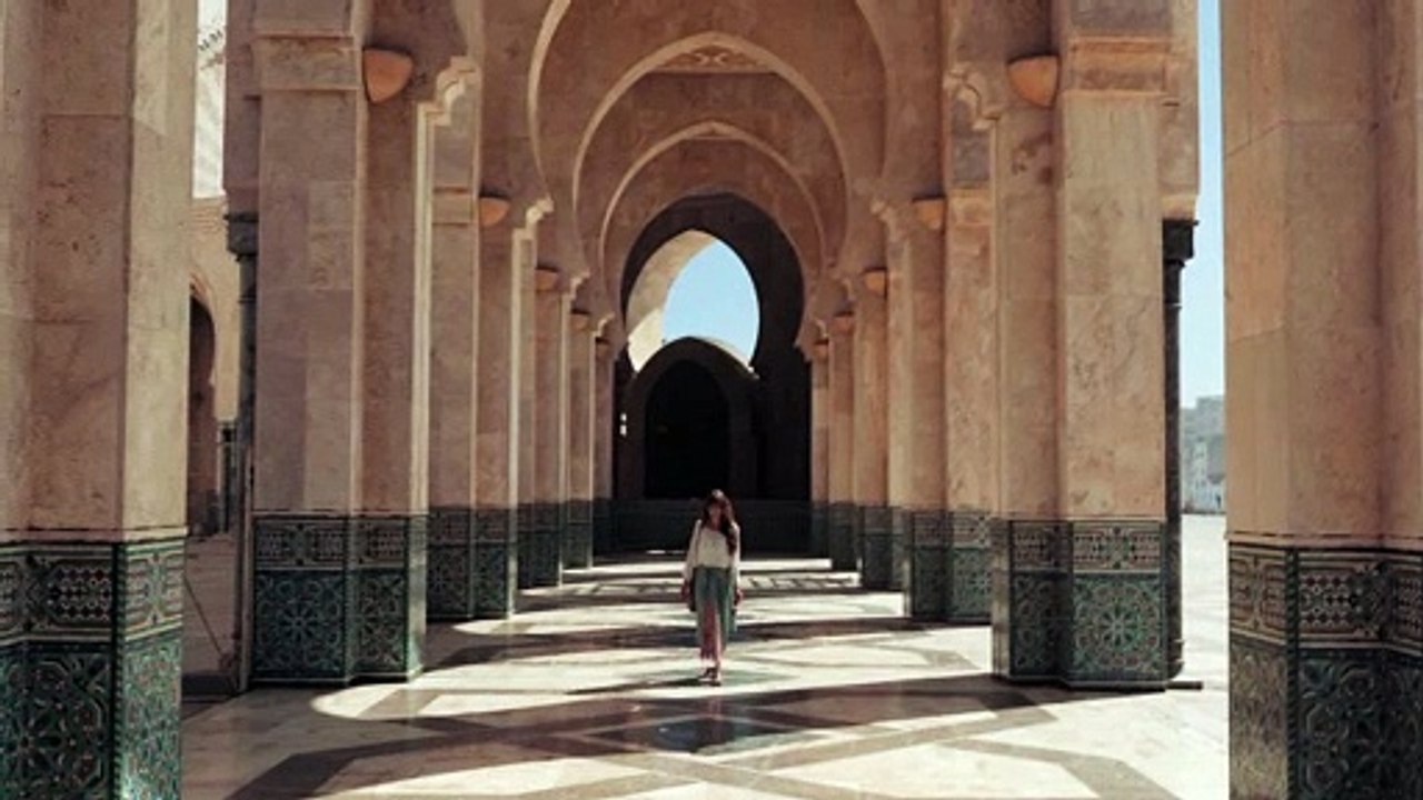 Taryn Elliott - Woman Walking in Casablanca - Human/City/Monument (No Copyright Video 17)