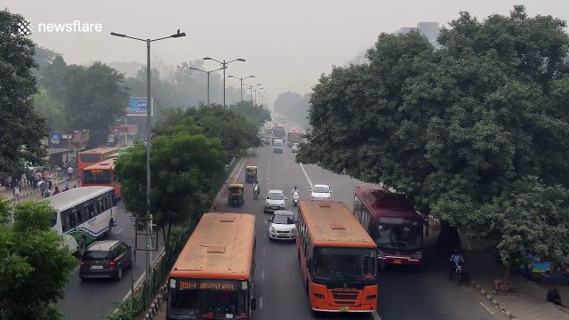 Indian government issues masks to schoolchildren as New Delhi chokes on thick smog