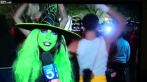 En direct à la TV ce déguisement bizarre d'Halloween derrière la journaliste !