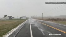 Howling winds and lake-effect snow scream down road
