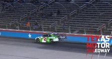 Reddick tags the wall racing Bell for the lead