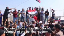 Protesters block the highway leading to Umm Qasr port in Basra
