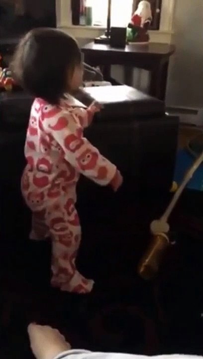 Baby Tries To Stand Up And Falls