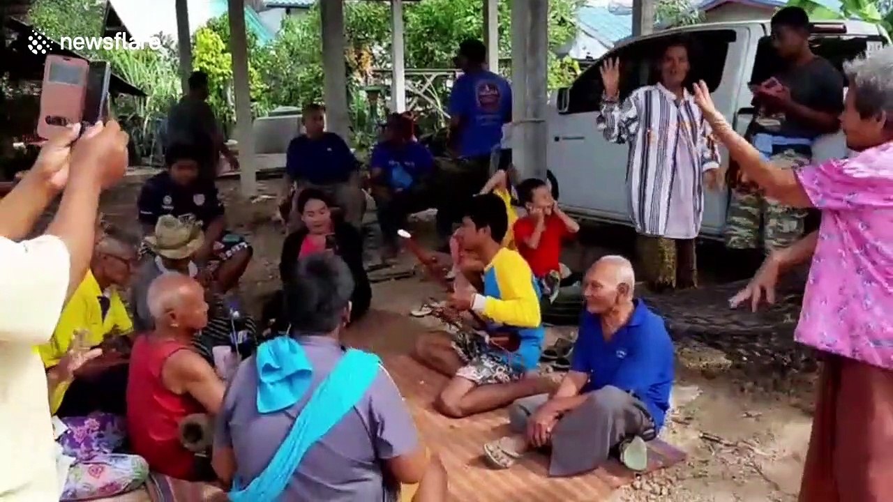 Villagers worship buffalo born with two heads in rural Thailand