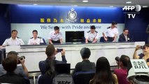 Journalists stage silent protest at Hong Kong police presser