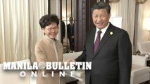 Xi Jinping meets embattled Hong Kong leader Carrie Lam