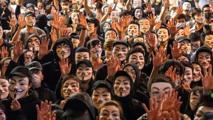 Protesters gather to mark one month since mask ban was introduced