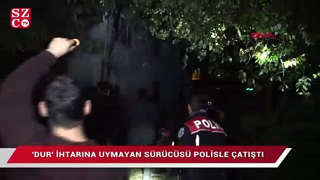 'Dur' ihtarına uymayan otomobilin sürücüsü çatıya çıktı, polisle çatıştı