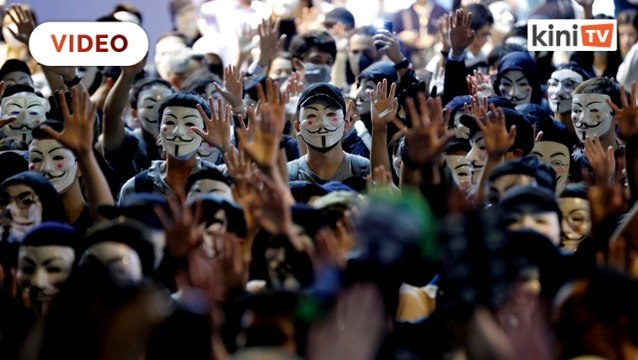 Hong Kong police use water cannon to break up 'Guy Fawkes' protest