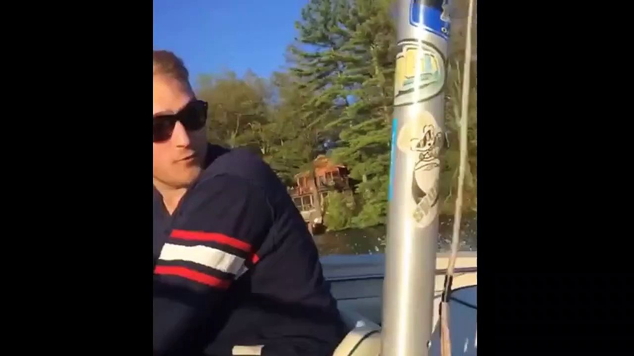 Guy On A Wake Surf Falls Into The Water Attempting To Jump A Wave