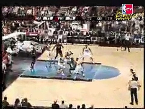 Dwyane Wade slams Over Rodney Carney's face for the Dunk