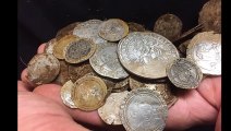 Metal detectorist find hoard of coins thought to be worth £100,000 in a field in Northern Ireland