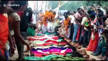 Indian women get stepped on by Hindu holy men in unique ritual to 'fulfil their wishes'