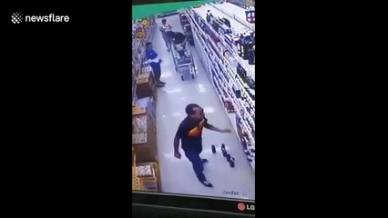 Thai shopper opens wine to taste in supermarket before buying