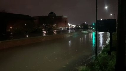 People told to "stay put" in a shopping centre by police after "biblical" rainfall causes heavy flooding