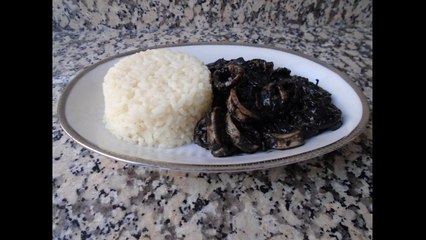Squids in black ink sauce
