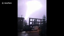 Spectacular moment lightning bolt strikes sea off coast of Greek island