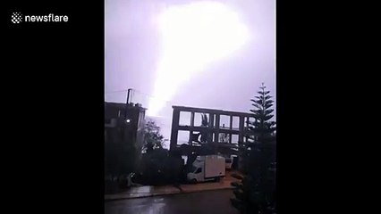 Download Video: Spectacular moment lightning bolt strikes sea off coast of Greek island