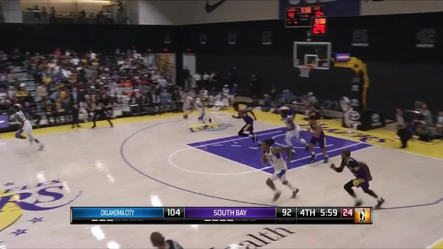Gary Payton II rises to block the shot