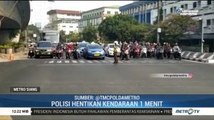 Polisi Hentikan Kendaraan Satu Menit, Ajak Pengendara Mengheningkan Cipta